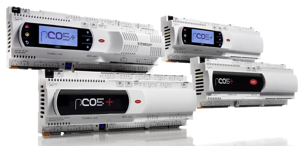 Photo with various pCO5+ controllers, with and without built-in terminal.