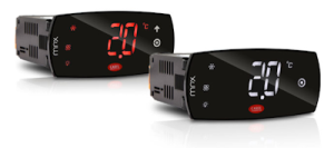 Photo of two panel mounted Carel MPXzero, red or white symbols/numbers on display.